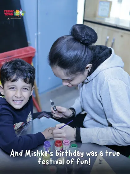 A young guest getting his arm painted by our talented tattoo artist. It's a fun and creative activity that kids absolutely love.