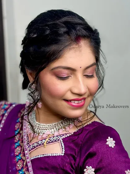 A beautiful, no-filter makeup look. The pink tones on the eyes and cheeks give a fresh, youthful glow.
