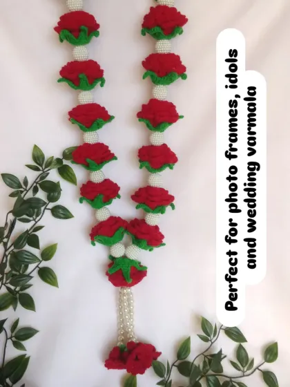 This view shows the length of the rose garland, making it ideal for photo frames of deities and gurus, or as a beautiful wedding varmala that the couple can cherish forever.