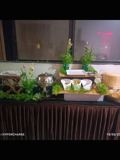 The complete buffet counter for the Griha Pravesh pooja. The setup is elegant and functional, making it easy for guests to serve themselves.
