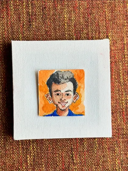 A flat lay of my mini Pratham portrait.