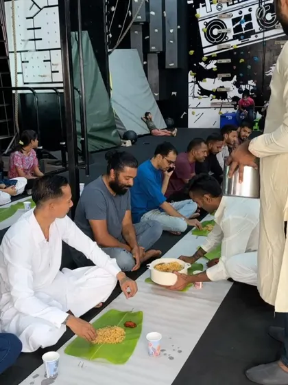 Our coaches serving up biryani. At Cali OG, everyone is part of the family, and we take care of each other.