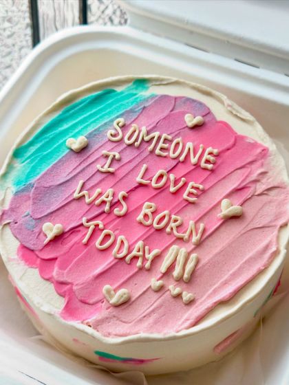 A close-up of our 'Someone I love was born today' bento cake, showing the textured buttercream and tiny piped hearts.