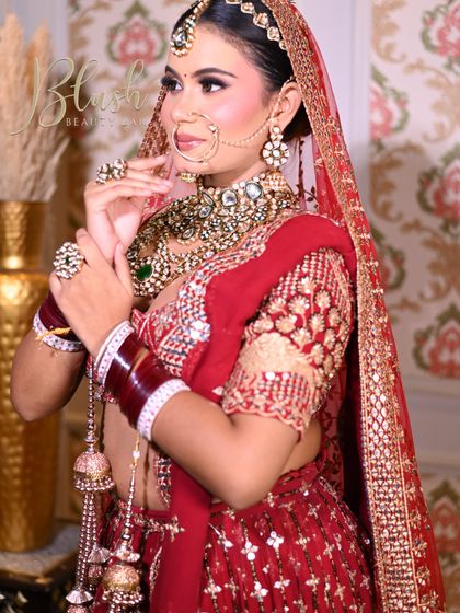 The side profile shows the beautiful hair and makeup styling done by a student.