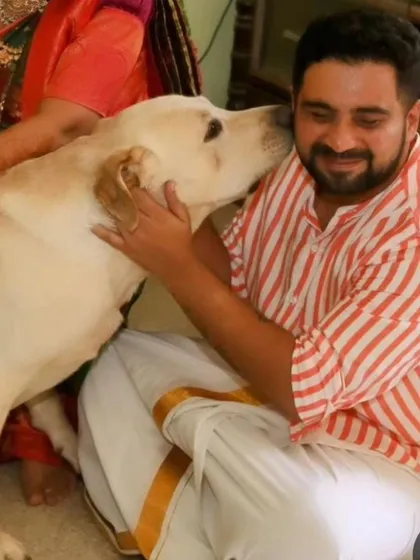 A tender moment between Ani and a rescue dog. This is the soft heart behind the tough activist who fights for them every day.