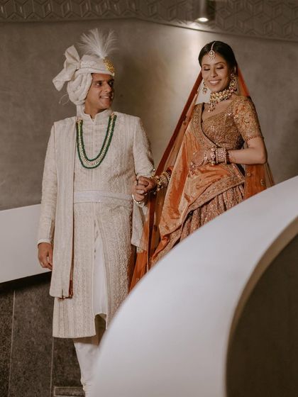 The happy couple descending the stairs, ready for their ceremony.