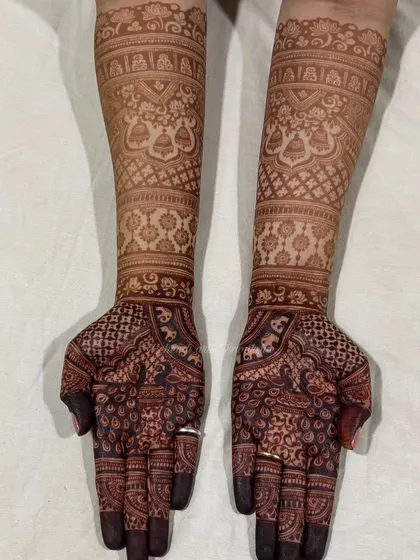 The rich, dark stain of a full bridal henna design, a result I always strive for.