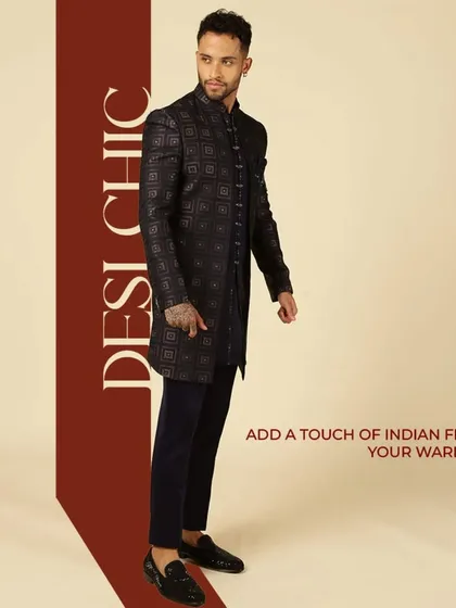 Add a touch of Indian flair to your wardrobe with this 'Desi Chic' Indo-Western jacket. The dark, structured piece with a geometric pattern is perfect for a sophisticated, modern look.
