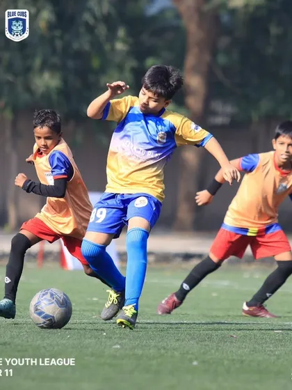 An action shot from the Under 11 Thane Youth Development League, showing our player's focus and control.
