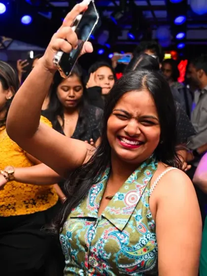 Seeing pure happiness on the dance floor is why I do this. This shot captures the exact moment the beat drops and nothing else matters. It’s all about creating memories like this.