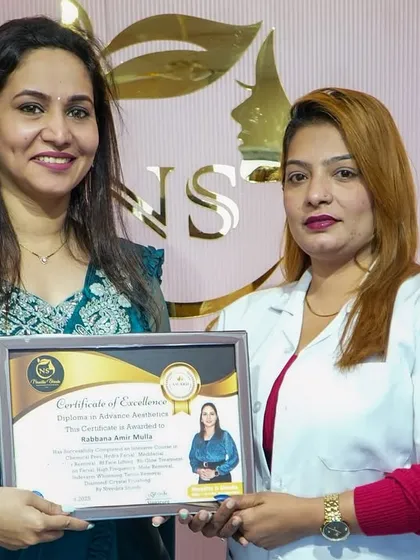 Presenting a Certificate of Excellence to a student from our Diploma in Advance Aesthetics. She is now ready for the next step in her career.