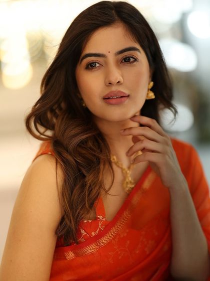 A classic and elegant shot of Amritha Aiyer, her makeup looking flawless and her expression serene.