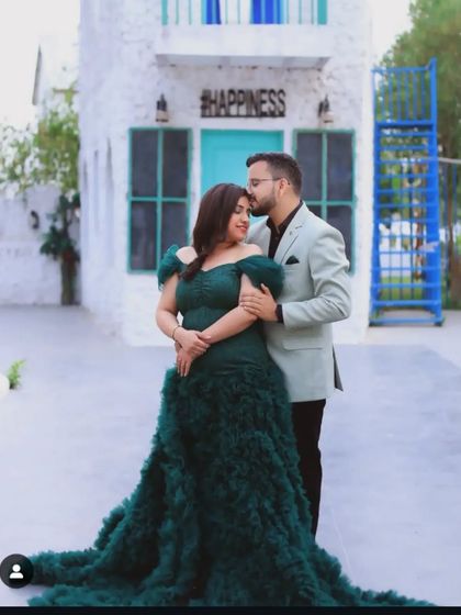 An intimate couple's portrait from a maternity shoot. The focus here is on the connection between the parents-to-be, captured in a quiet, tender moment.