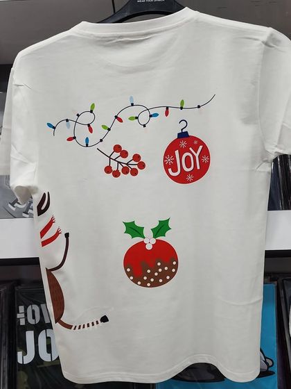A look at the back of the custom Christmas t-shirt, featuring festive ornaments and lights. I can print on both the front and back of your apparel.