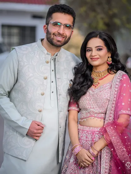 A classic, happy portrait of the engaged couple.