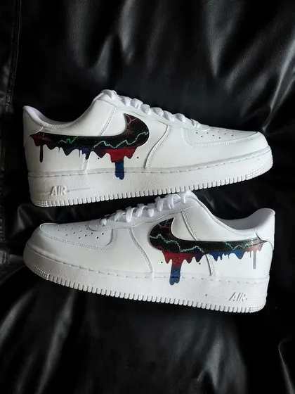 A pair shot of the galaxy drip custom sneakers.