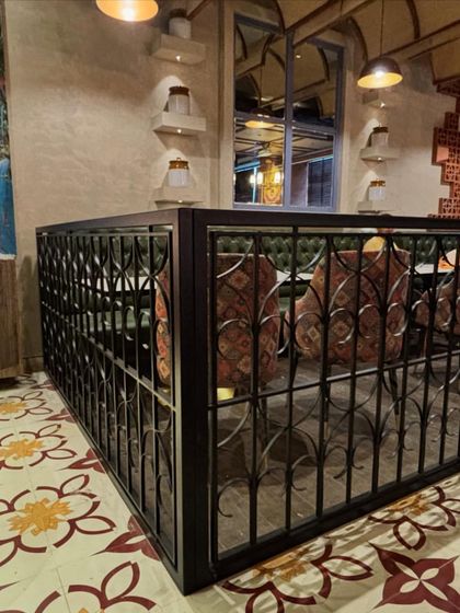 A look at our private dining area, with traditional floor tiles and elegant ironwork. Perfect for a more intimate gathering.