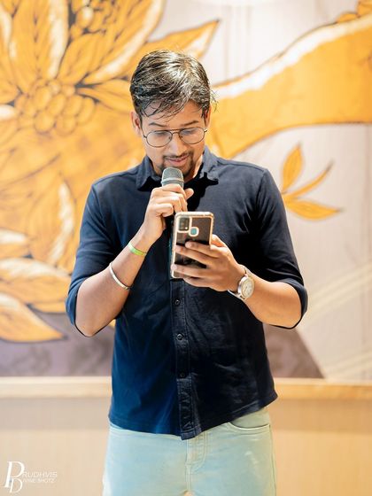 A smiling performer at our "Voices of the Nation" event. The community came together to celebrate freedom and creativity.