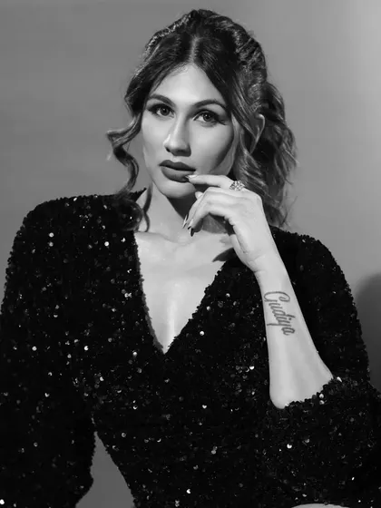 A classic black and white portrait of Nidhi Tapadia. For this, I created a sophisticated look with sculpted waves, a bold lip, and defined eyes that translate beautifully into monochrome.