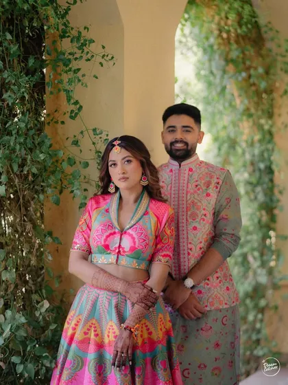 A stylish couple portrait from a vibrant Haldi ceremony at the beautiful Sula Vineyards in Nashik.