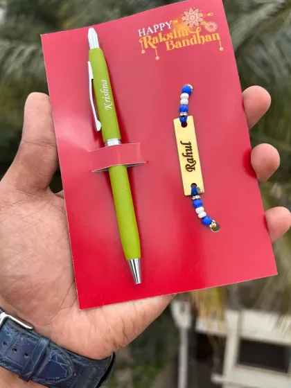The turbo pen and rakhi combo shown in a vibrant green color.
