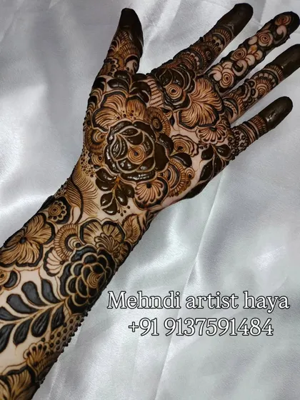 The complete view of this floral bridal design, showcasing how the pattern creates a cohesive and stunning piece of body art.