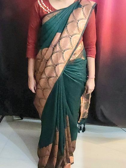 The final drape achieved by a student in my workshop, showing a classic style perfect for any occasion.