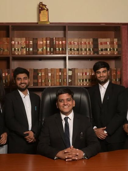 A portrait with some of my junior colleagues in my office. Mentoring them and watching them grow is one of the most rewarding aspects of my work.