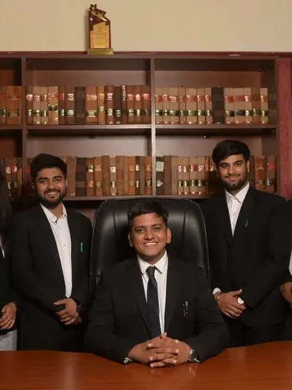 A portrait with some of my junior colleagues in my office. Mentoring them and watching them grow is one of the most rewarding aspects of my work.
