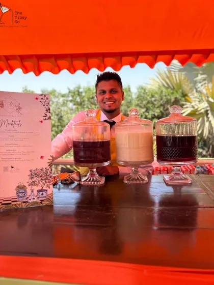 Our mocktail station, featuring large glass dispensers filled with colorful, fresh-made non-alcoholic beverages. It’s an inviting and delicious option for all guests.