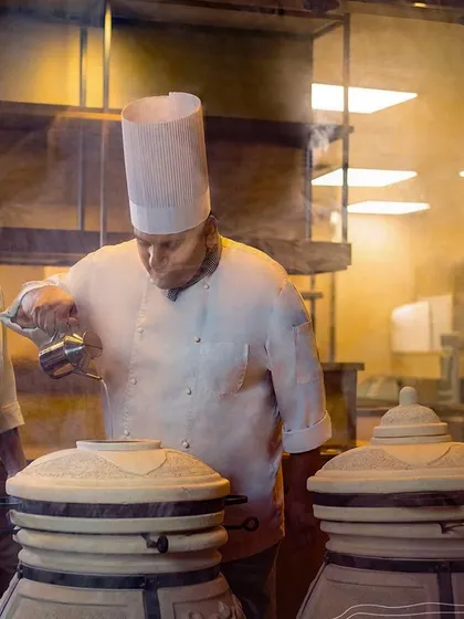 Our chefs are masters of the tandoor, using traditional clay ovens to lock in flavor and create perfectly cooked dishes. This is where authentic techniques meet modern culinary excellence.