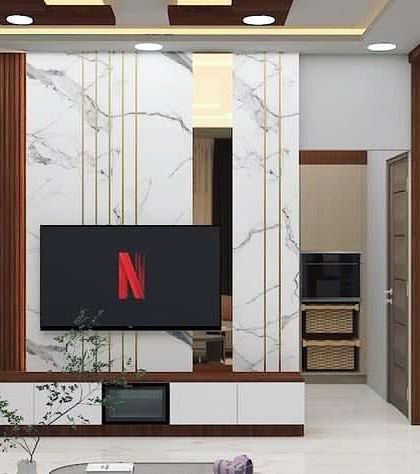A TV unit designed for an upcoming project in Nagarbhavi. The theme for the living room is a stone-finish laminate back panel with golden T-strips and contrasting wooden rafters.