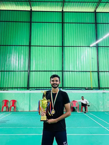 Proudly holding the team event runner-up trophy from the Mumbai University inter-collegiate tournament.