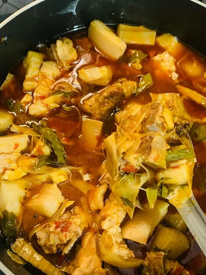 A mixed vegetable curry with pork.