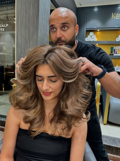 Another shot of the beautiful blonde transformation, showing off the incredible volume and beautiful color blend.