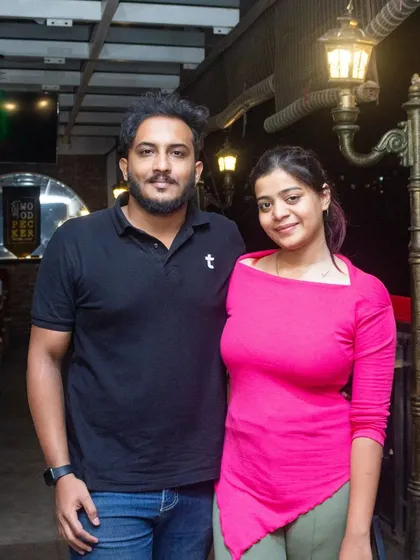 A couple enjoying their date night at the pub.