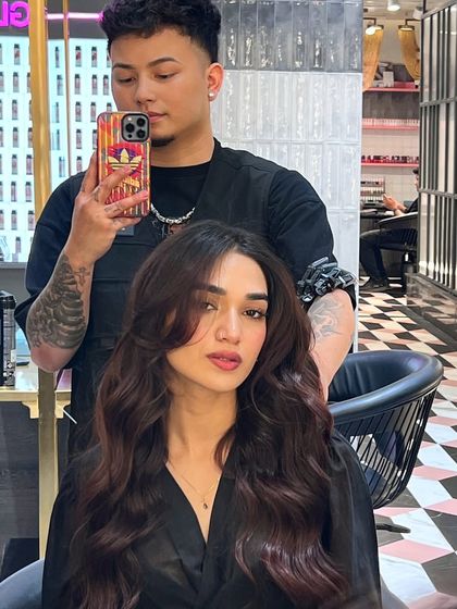 A new hairstyle and a new attitude to match. This client is rocking her fresh cut and color with confidence.