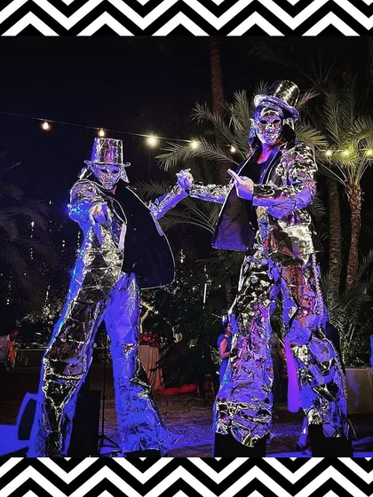 We even had mirror-costumed performers on stilts to welcome guests, adding to the glamorous and slightly surreal atmosphere of the Sangeet.