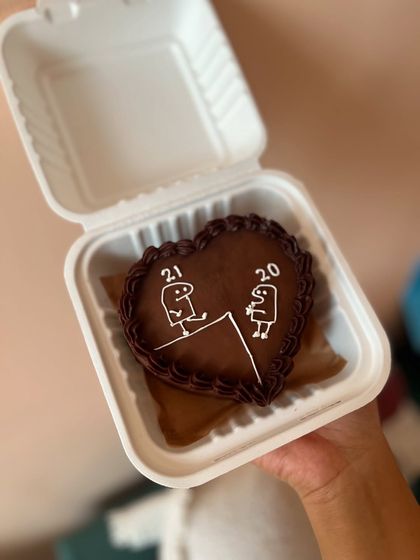 Another fun take on the Flork meme, this time as a heart-shaped chocolate bento cake for an anniversary or inside joke between friends.