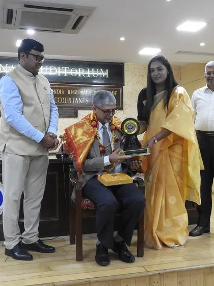 Another view of the felicitation ceremony at the bank audit workshop.