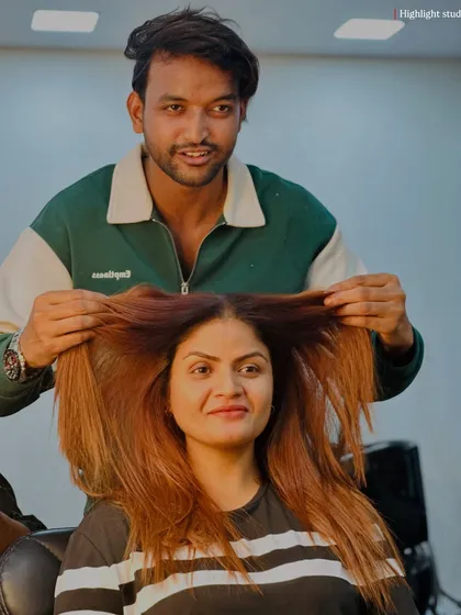 Your hair is our responsibility, and your happiness is our goal. A great shot of our artist with a satisfied client.