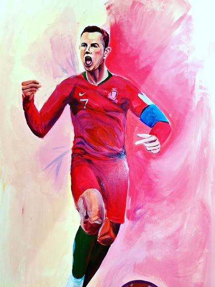 Art can capture action and energy. This mural of Cristiano Ronaldo, painted with acrylics, shows how we can use bold colors and dynamic strokes to create powerful images.