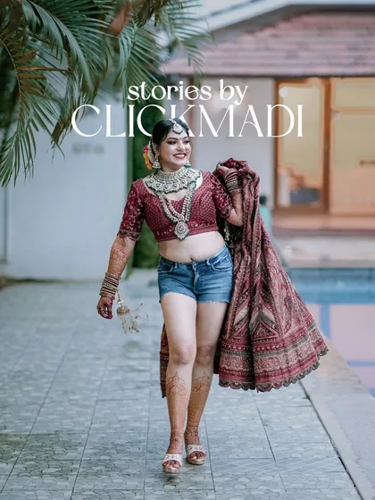 Your wedding day should be fun and reflect your personality. This bride's playful moment, pairing her traditional lehenga top with denim shorts by the pool, shows the relaxed and modern side of wedding celebrations that I love to capture.
