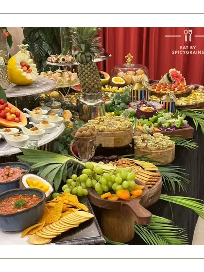 Tropical vibes for this stunning grazing table. We used whole pineapples, palm leaves, and an abundance of colorful fruits to create a lush, vacation-like feel for this celebratory spread.
