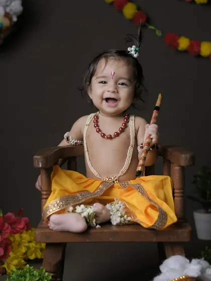 Our Little Krishna photoshoots are a popular choice for capturing cultural traditions. We style your child with adorable costumes and props like a flute and peacock feather, creating a divine and memorable portrait.