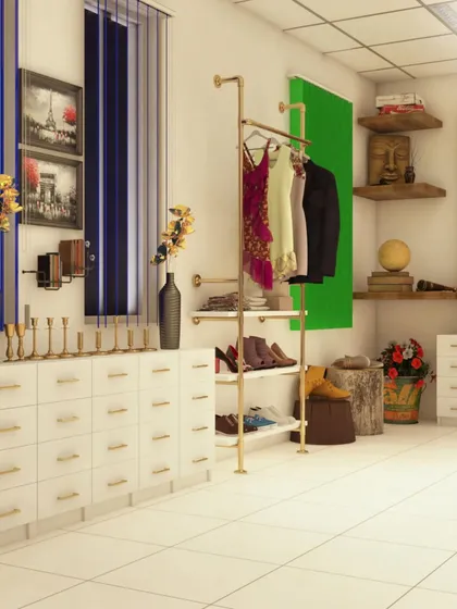 This area combines different types of retail displays. It includes a multi-level clothing rack for hanging items, drawer storage for back stock, and corner shelves for decorative pieces, showing how to maximize a small corner space.