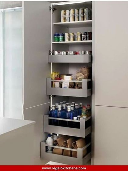 This pull-out pantry features deep, solid-sided drawers, perfect for storing cans, bottles, and boxes securely. The different shelf heights accommodate a variety of items, making it a versatile storage solution.