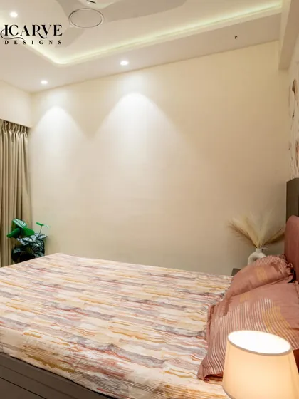 A different perspective of the bedroom, showing the clean lines and calm colors that promote peace.