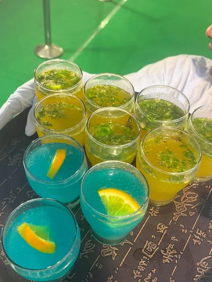 A tray of vibrant mocktails. We ensure our non-alcoholic options are just as creative and delicious as our cocktails.