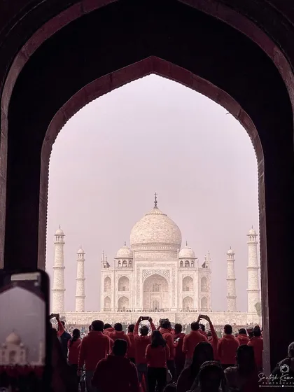 The Taj Mahal, a symbol of eternal love, framed through an archway. I wanted to capture not just the monument, but the experience of seeing it, surrounded by others who are also trying to hold onto the moment.